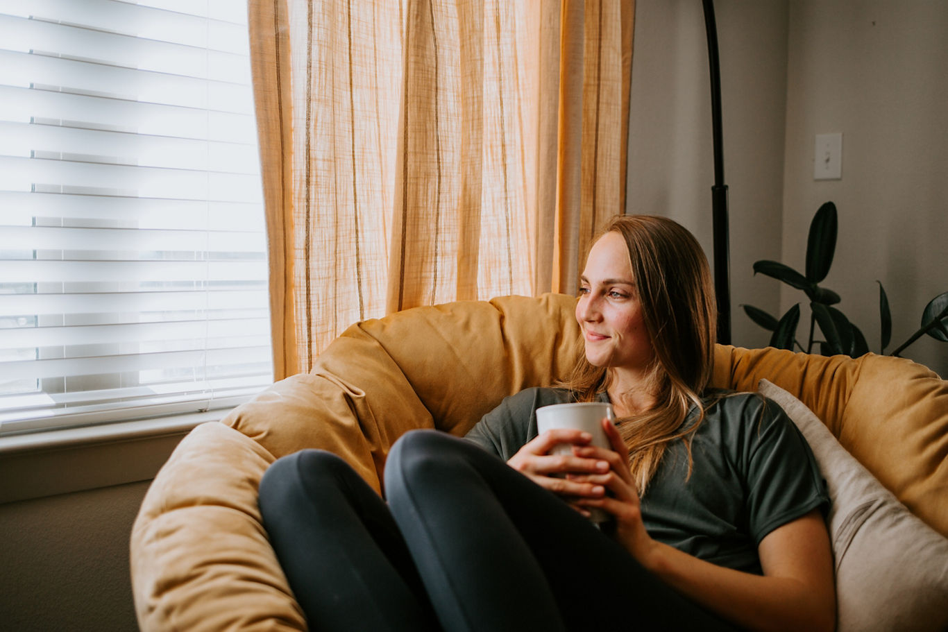 Woman Relaxing with Cup of Coffee | Blog | Greystar